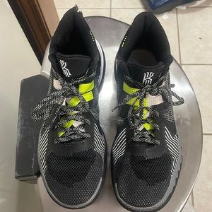 Kyrie Irving, size 10 mens, green and black